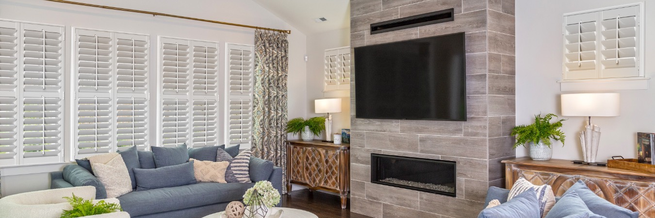 Interior shutters in Minnetonka living room with fireplace