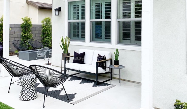 Spending a little time weeding and mulching can provide you with an outside oasis. An outdoor with plantation window treatments