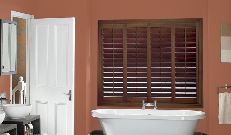Put old paint to proper use and give your rooms a new life. Plantation shutters in a bathroom