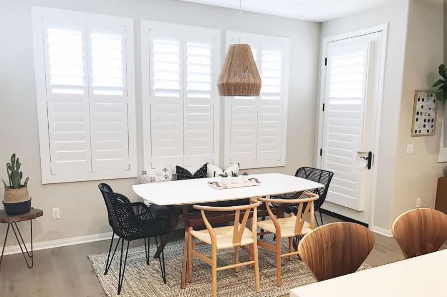 Use Polywood shutters to control natural light levels in your Minneapolis dining room. Polywood shutters with top louvers tilted open in a dining room