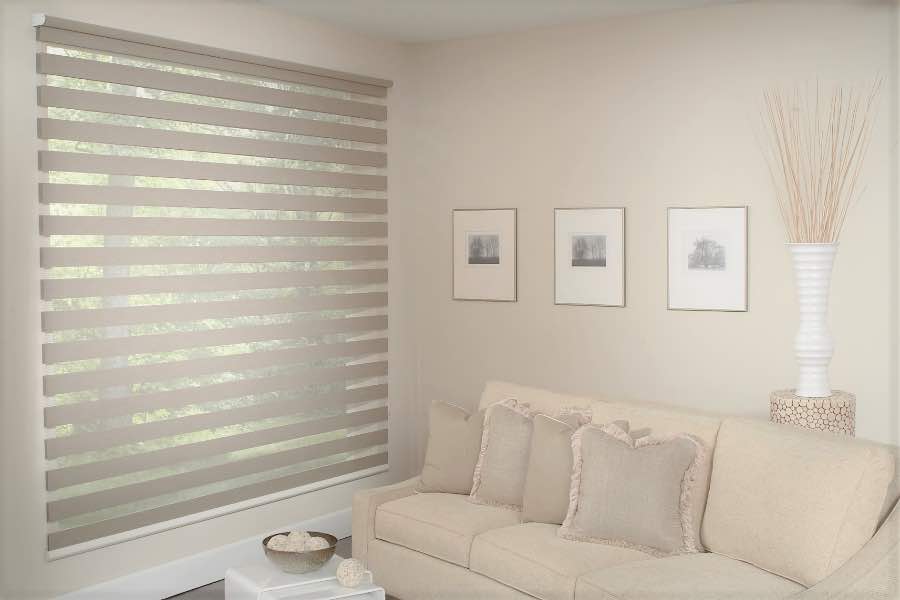 Zebra shades give you a unique combination of light control and style that benefits your Minneapolis home. Zebra shade allows filtered light into a living room