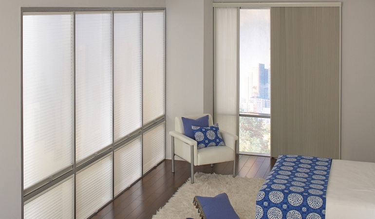 Cell shades are another option to reflect a minimalist design. Cellular shades in a minimalistic apartment.