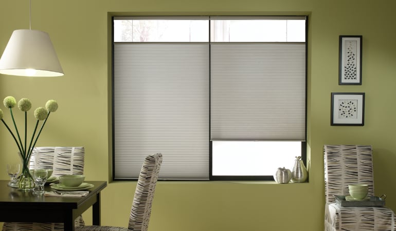 Cellular shades will keep a room's temperature consistent and reduce energy costs.  Cellular shades in a Minneapolis dining room
