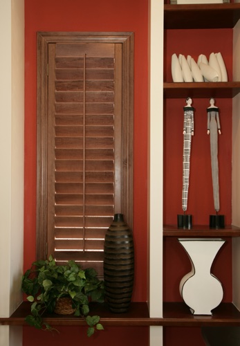 You can even coordinate your wood shutters with shelving. Minneapolis wood shutter shelving