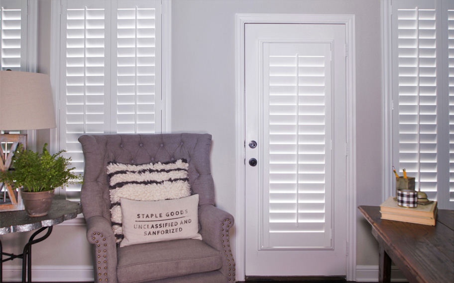 Interior shutters are beautiful and durable window treatments for glass doors in Minneapolis. Polywood shutters on a door